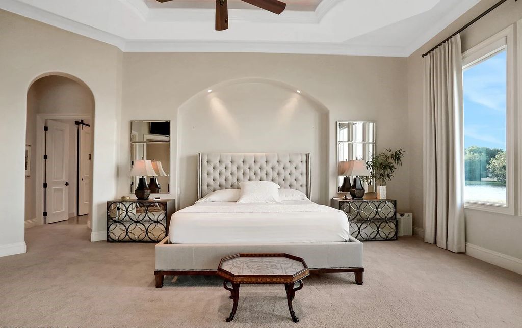 13897 Bella Riva Lane, Jacksonville, Florida, is located on the intracoastal waterway in prestigious Queen's Harbour and is perfect for formal or casual entertaining. The elegant, contemporary home has a 2-story layout with panoramic vistas of the Intracoastal and marshes, offering privacy and spectacular views.