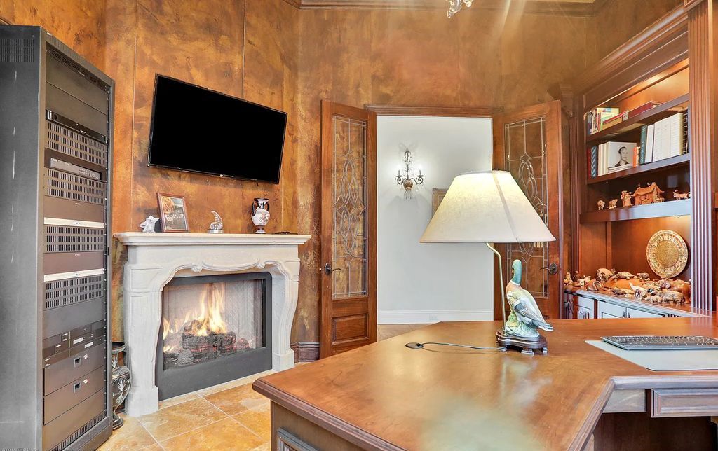 13897 Bella Riva Lane, Jacksonville, Florida, is located on the intracoastal waterway in prestigious Queen's Harbour and is perfect for formal or casual entertaining. The elegant, contemporary home has a 2-story layout with panoramic vistas of the Intracoastal and marshes, offering privacy and spectacular views.