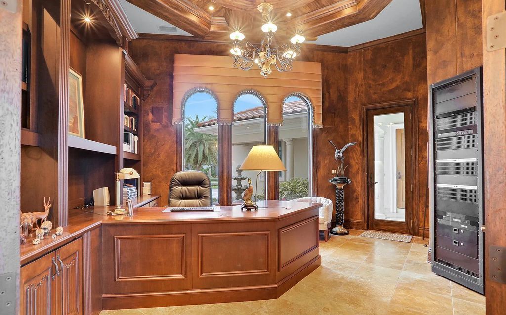 13897 Bella Riva Lane, Jacksonville, Florida, is located on the intracoastal waterway in prestigious Queen's Harbour and is perfect for formal or casual entertaining. The elegant, contemporary home has a 2-story layout with panoramic vistas of the Intracoastal and marshes, offering privacy and spectacular views.