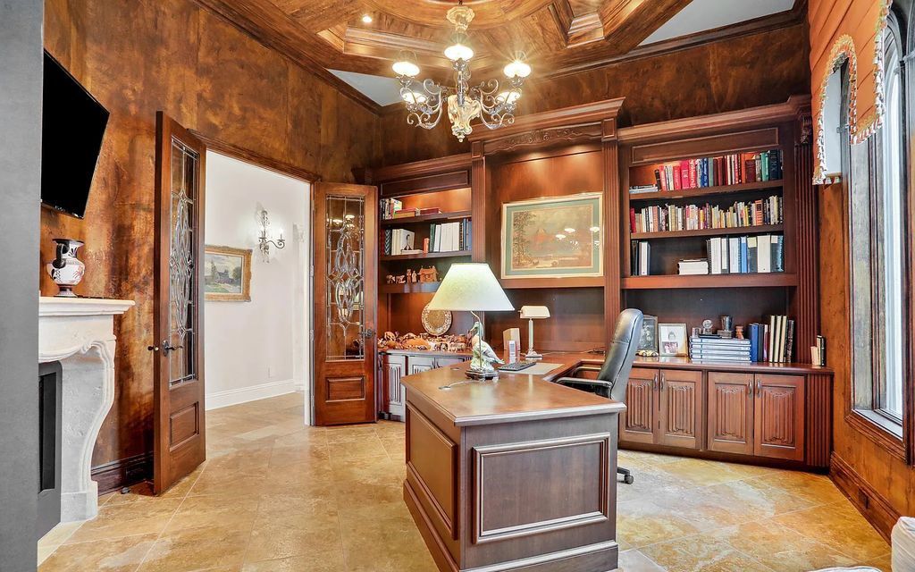 13897 Bella Riva Lane, Jacksonville, Florida, is located on the intracoastal waterway in prestigious Queen's Harbour and is perfect for formal or casual entertaining. The elegant, contemporary home has a 2-story layout with panoramic vistas of the Intracoastal and marshes, offering privacy and spectacular views.