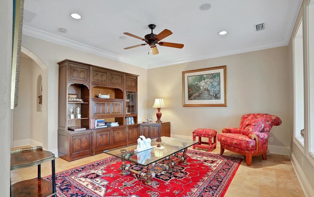 13897 Bella Riva Lane, Jacksonville, Florida, is located on the intracoastal waterway in prestigious Queen's Harbour and is perfect for formal or casual entertaining. The elegant, contemporary home has a 2-story layout with panoramic vistas of the Intracoastal and marshes, offering privacy and spectacular views.