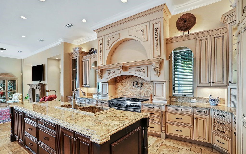 13897 Bella Riva Lane, Jacksonville, Florida, is located on the intracoastal waterway in prestigious Queen's Harbour and is perfect for formal or casual entertaining. The elegant, contemporary home has a 2-story layout with panoramic vistas of the Intracoastal and marshes, offering privacy and spectacular views.