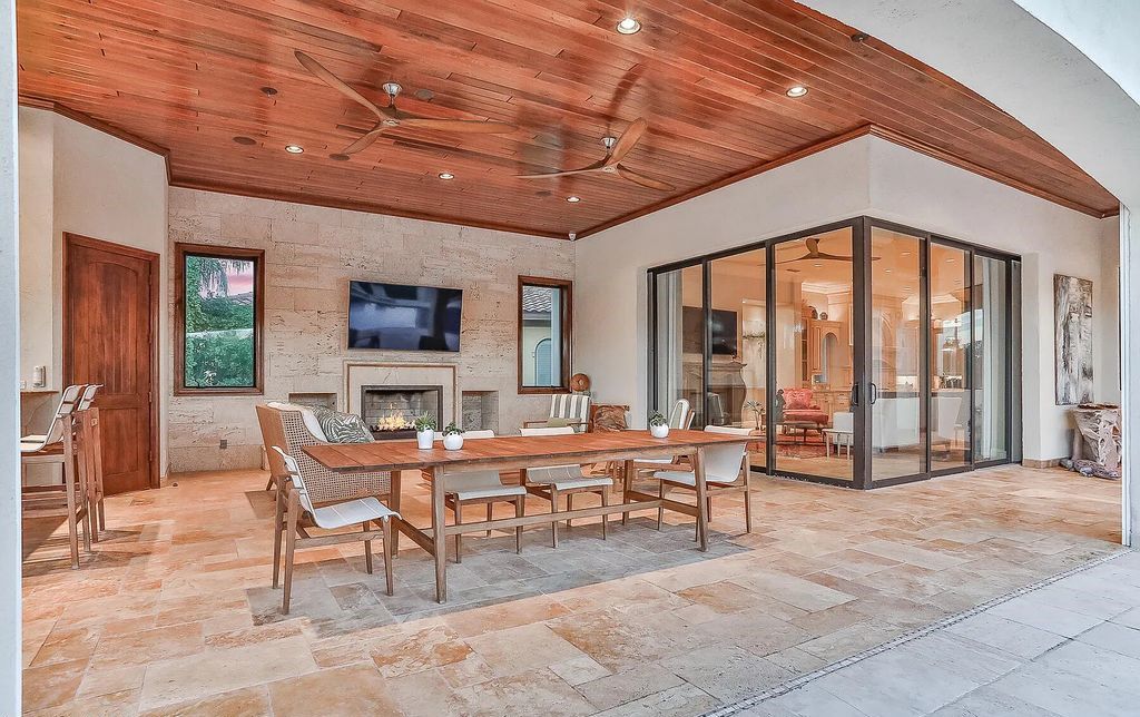 13897 Bella Riva Lane, Jacksonville, Florida, is located on the intracoastal waterway in prestigious Queen's Harbour and is perfect for formal or casual entertaining. The elegant, contemporary home has a 2-story layout with panoramic vistas of the Intracoastal and marshes, offering privacy and spectacular views.