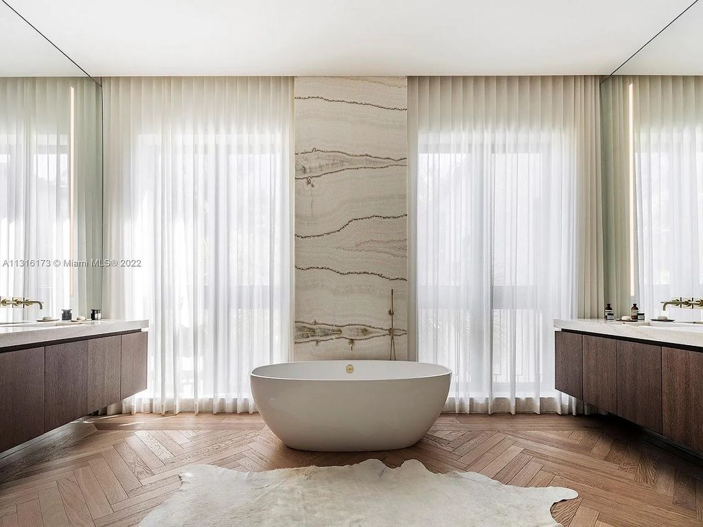 3541 Flamingo Drive, Miami Beach, Florida,  is an elegant home with travertine flooring, oak walls, and stones. This newly built structure was designed as a modern redux with an unprecedented level of luxury.