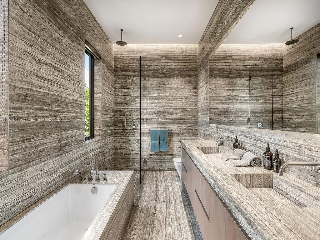 3541 Flamingo Drive, Miami Beach, Florida,  is an elegant home with travertine flooring, oak walls, and stones. This newly built structure was designed as a modern redux with an unprecedented level of luxury.