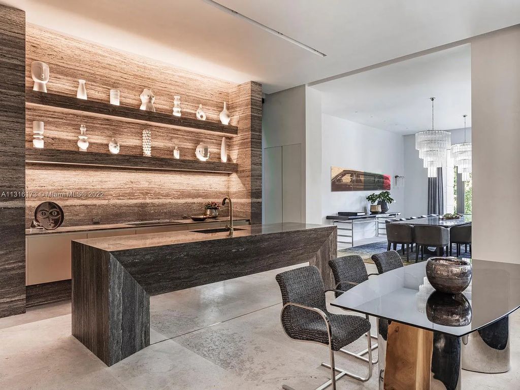 3541 Flamingo Drive, Miami Beach, Florida,  is an elegant home with travertine flooring, oak walls, and stones. This newly built structure was designed as a modern redux with an unprecedented level of luxury.