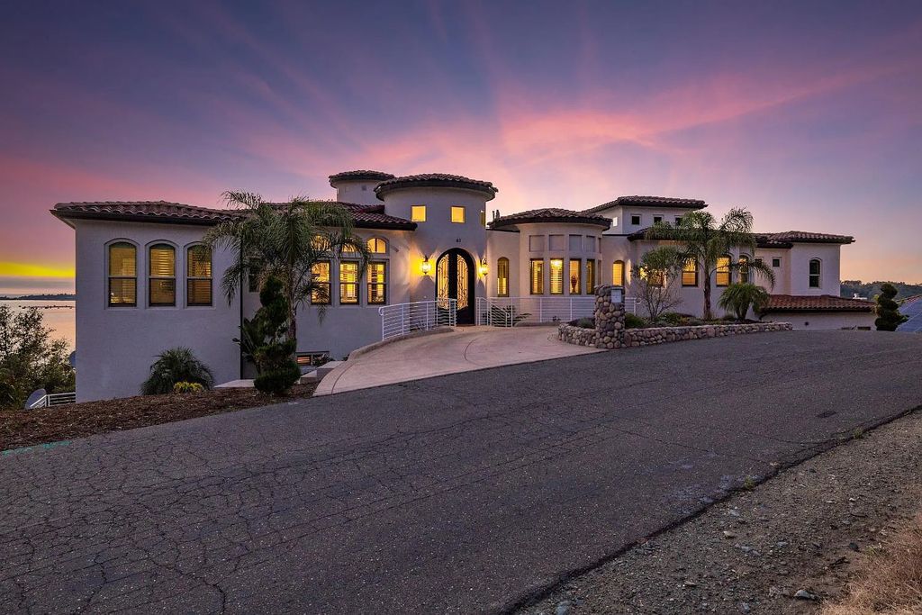 61 Guadalupe Drive, El Dorado Hills, California is a stunning residence nestled amongst the oaks and granite outcroppings provides endless skylines & breathtaking water views.