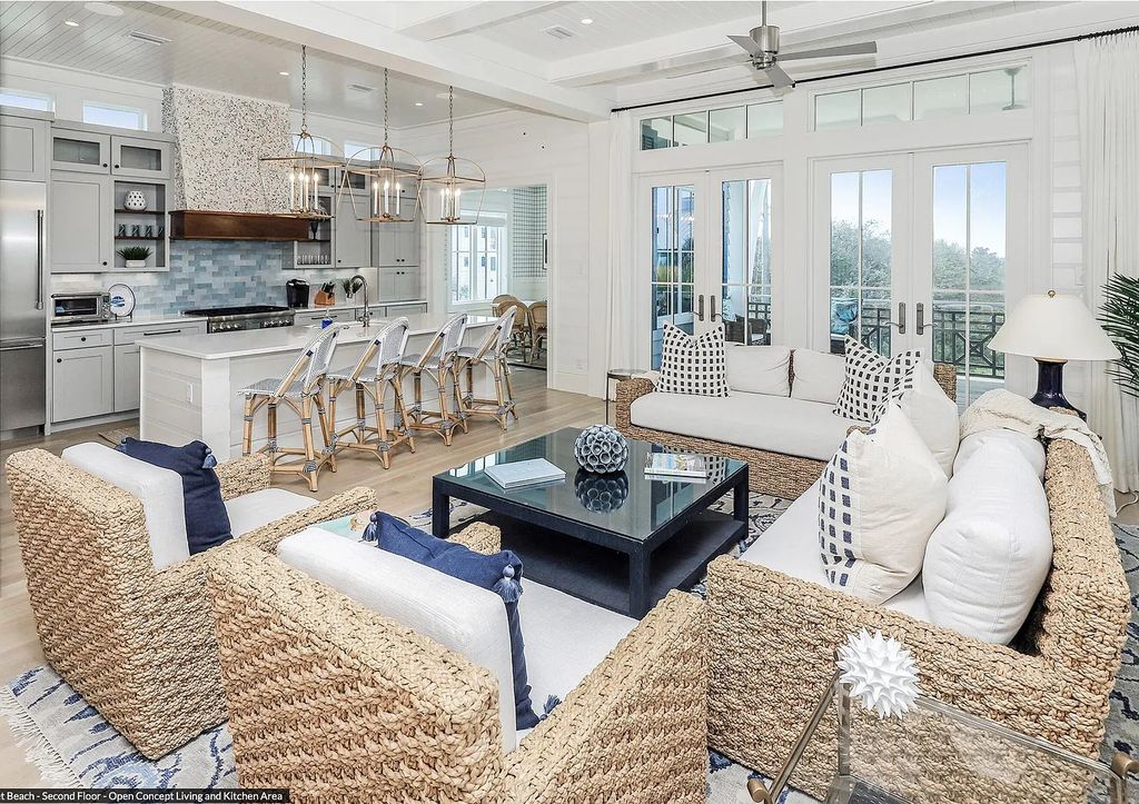 178 Pompano Street, Inlet Beach, Florida is an extraordinary Nantucket inspired home located only 200 yards away from the sandy white beaches of Inlet Beach with vaulted pecky cypress ceilings, leather porcelain floors, and the highest grade finishes.