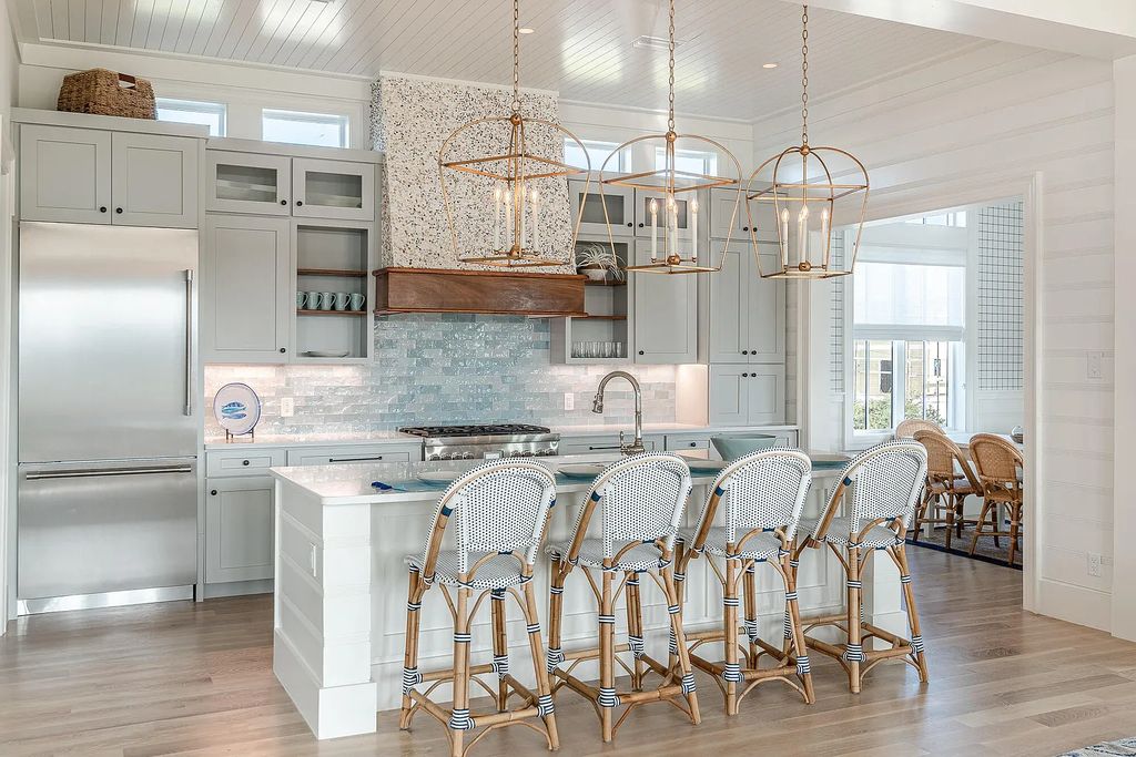 178 Pompano Street, Inlet Beach, Florida is an extraordinary Nantucket inspired home located only 200 yards away from the sandy white beaches of Inlet Beach with vaulted pecky cypress ceilings, leather porcelain floors, and the highest grade finishes.
