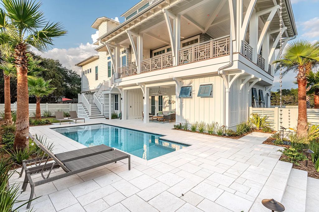 178 Pompano Street, Inlet Beach, Florida is an extraordinary Nantucket inspired home located only 200 yards away from the sandy white beaches of Inlet Beach with vaulted pecky cypress ceilings, leather porcelain floors, and the highest grade finishes.