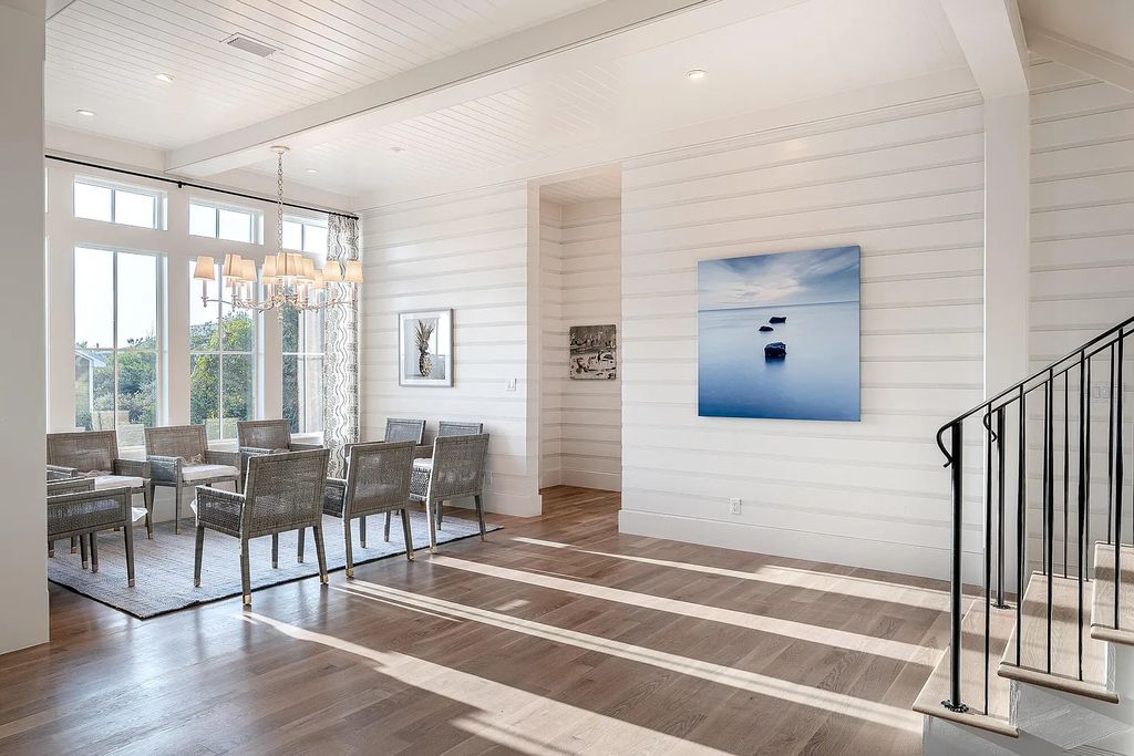 178 Pompano Street, Inlet Beach, Florida is an extraordinary Nantucket inspired home located only 200 yards away from the sandy white beaches of Inlet Beach with vaulted pecky cypress ceilings, leather porcelain floors, and the highest grade finishes.