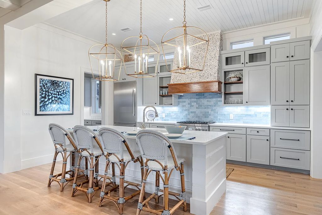 178 Pompano Street, Inlet Beach, Florida is an extraordinary Nantucket inspired home located only 200 yards away from the sandy white beaches of Inlet Beach with vaulted pecky cypress ceilings, leather porcelain floors, and the highest grade finishes.