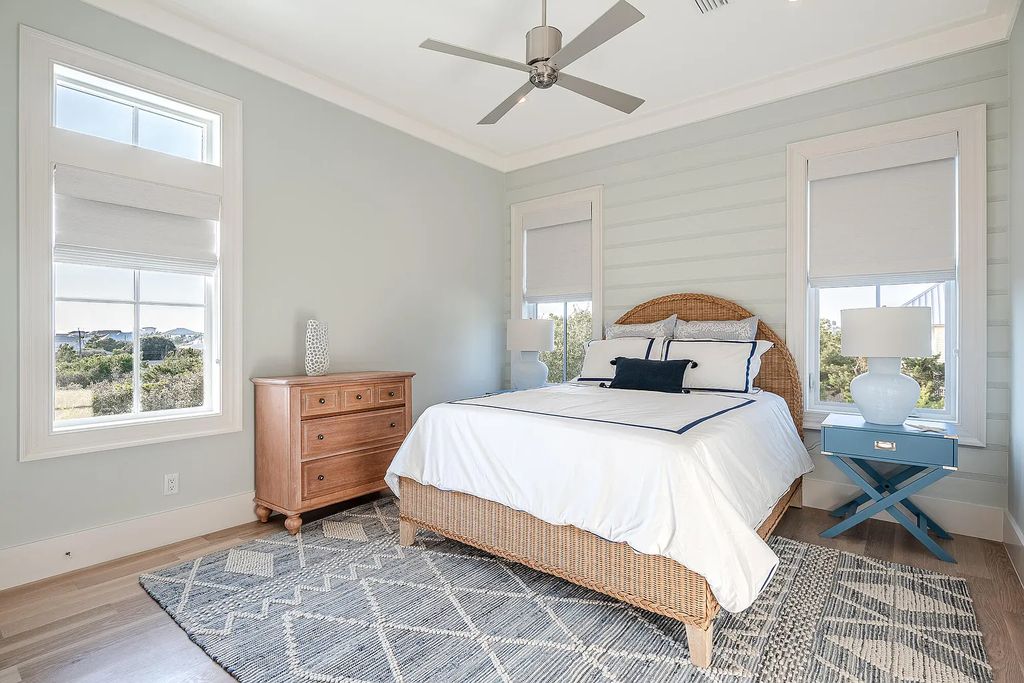 178 Pompano Street, Inlet Beach, Florida is an extraordinary Nantucket inspired home located only 200 yards away from the sandy white beaches of Inlet Beach with vaulted pecky cypress ceilings, leather porcelain floors, and the highest grade finishes.