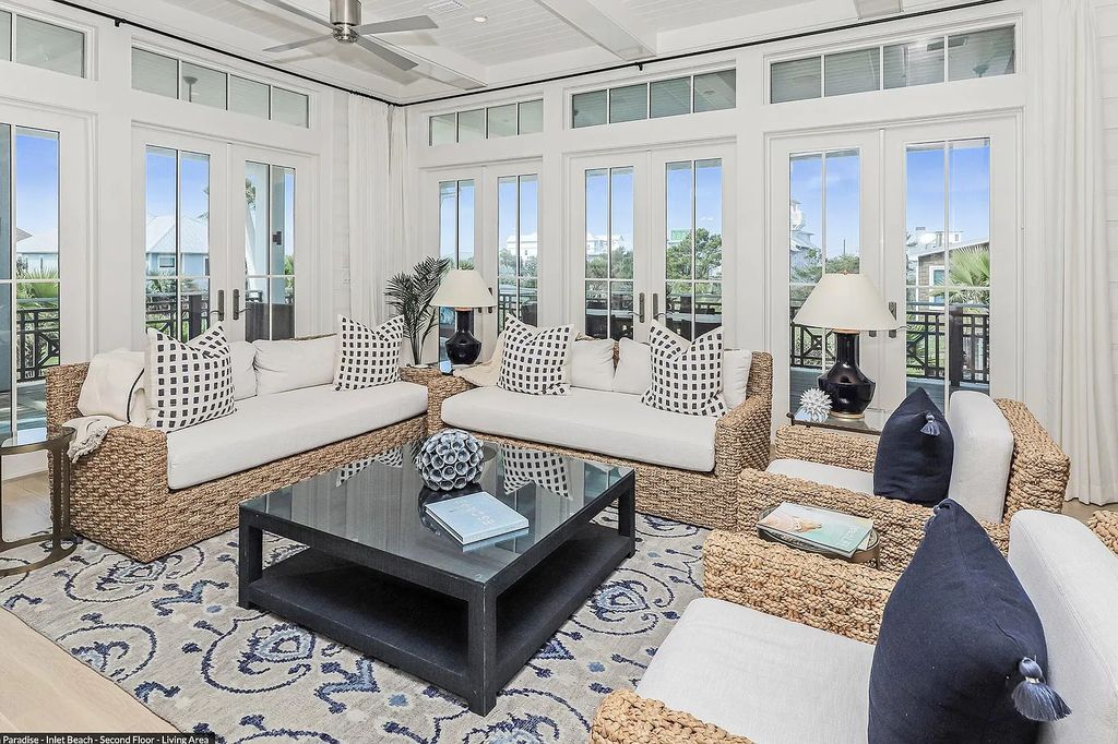 178 Pompano Street, Inlet Beach, Florida is an extraordinary Nantucket inspired home located only 200 yards away from the sandy white beaches of Inlet Beach with vaulted pecky cypress ceilings, leather porcelain floors, and the highest grade finishes.