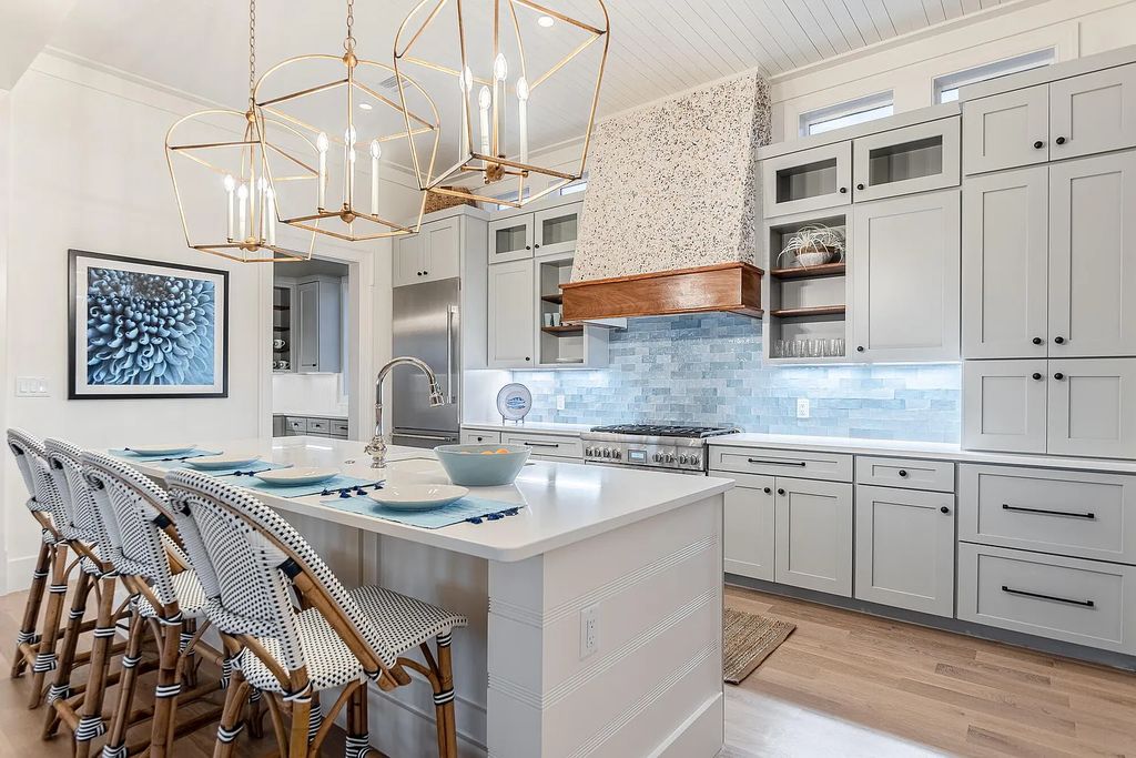 178 Pompano Street, Inlet Beach, Florida is an extraordinary Nantucket inspired home located only 200 yards away from the sandy white beaches of Inlet Beach with vaulted pecky cypress ceilings, leather porcelain floors, and the highest grade finishes.