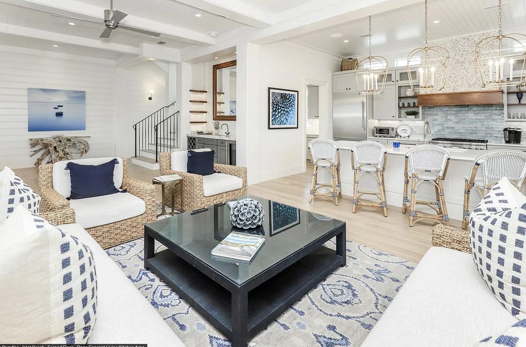 178 Pompano Street, Inlet Beach, Florida is an extraordinary Nantucket inspired home located only 200 yards away from the sandy white beaches of Inlet Beach with vaulted pecky cypress ceilings, leather porcelain floors, and the highest grade finishes.