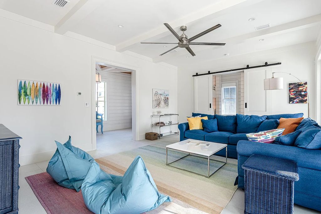 178 Pompano Street, Inlet Beach, Florida is an extraordinary Nantucket inspired home located only 200 yards away from the sandy white beaches of Inlet Beach with vaulted pecky cypress ceilings, leather porcelain floors, and the highest grade finishes.