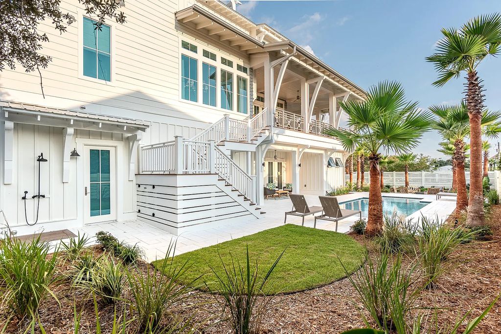 178 Pompano Street, Inlet Beach, Florida is an extraordinary Nantucket inspired home located only 200 yards away from the sandy white beaches of Inlet Beach with vaulted pecky cypress ceilings, leather porcelain floors, and the highest grade finishes.