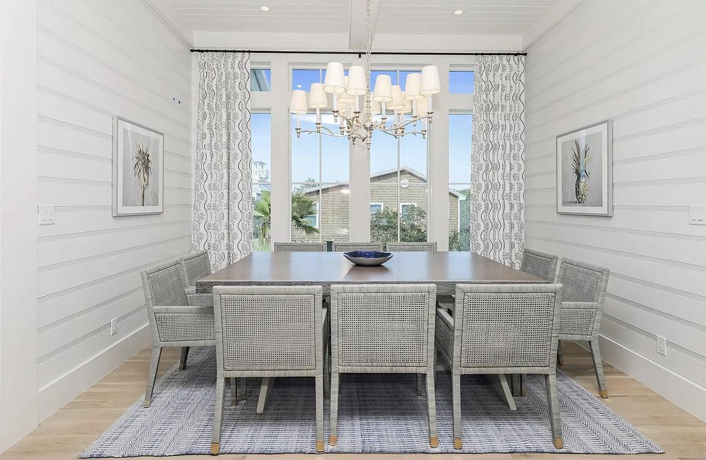 178 Pompano Street, Inlet Beach, Florida is an extraordinary Nantucket inspired home located only 200 yards away from the sandy white beaches of Inlet Beach with vaulted pecky cypress ceilings, leather porcelain floors, and the highest grade finishes.