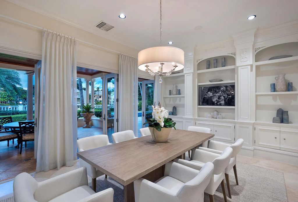 1207 Spanish River Road, Boca Raton, Florida is situated on a beautifully landscaped half-acre lot with breathtaking Intracoastal Waterway sunset views from the loggias and balconies of this magnificent estate. The ultimate Boca Raton, South Florida oasis features unparalleled magnificence, timeless beauty, and provides a unique opportunity to experience a luxury lifestyle at its most refined.