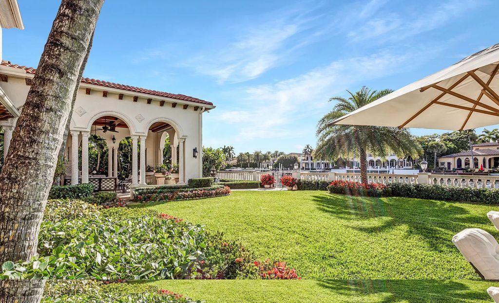 1207 Spanish River Road, Boca Raton, Florida is situated on a beautifully landscaped half-acre lot with breathtaking Intracoastal Waterway sunset views from the loggias and balconies of this magnificent estate. The ultimate Boca Raton, South Florida oasis features unparalleled magnificence, timeless beauty, and provides a unique opportunity to experience a luxury lifestyle at its most refined.