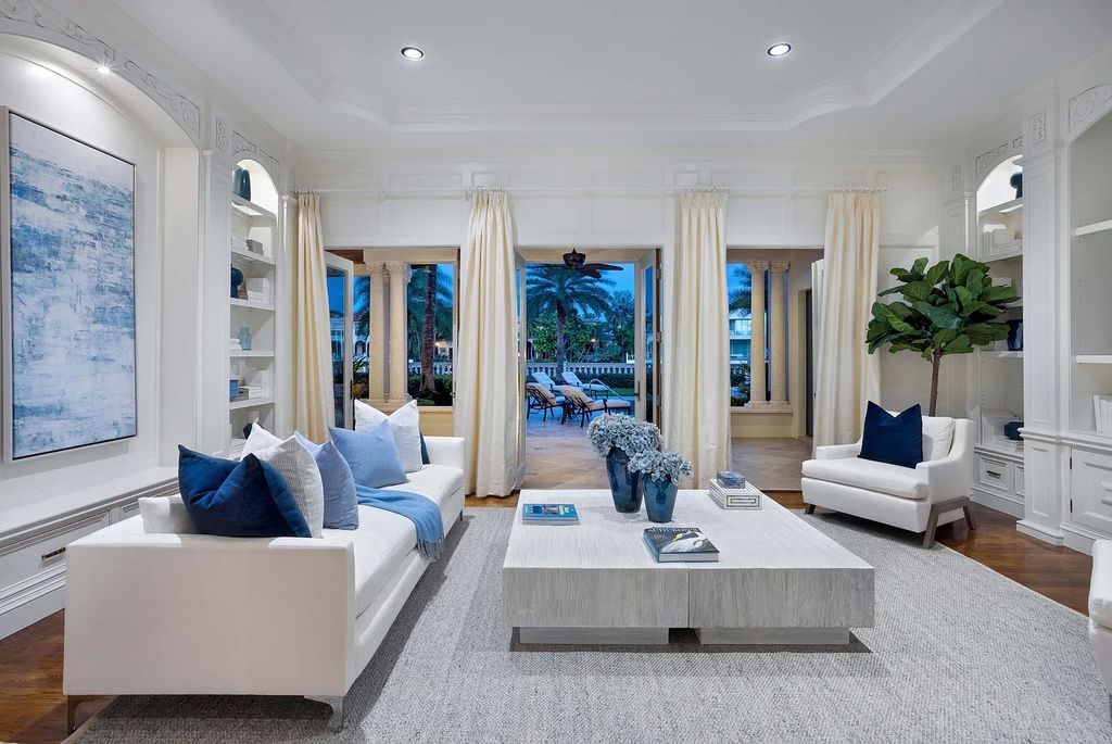 1207 Spanish River Road, Boca Raton, Florida is situated on a beautifully landscaped half-acre lot with breathtaking Intracoastal Waterway sunset views from the loggias and balconies of this magnificent estate. The ultimate Boca Raton, South Florida oasis features unparalleled magnificence, timeless beauty, and provides a unique opportunity to experience a luxury lifestyle at its most refined.