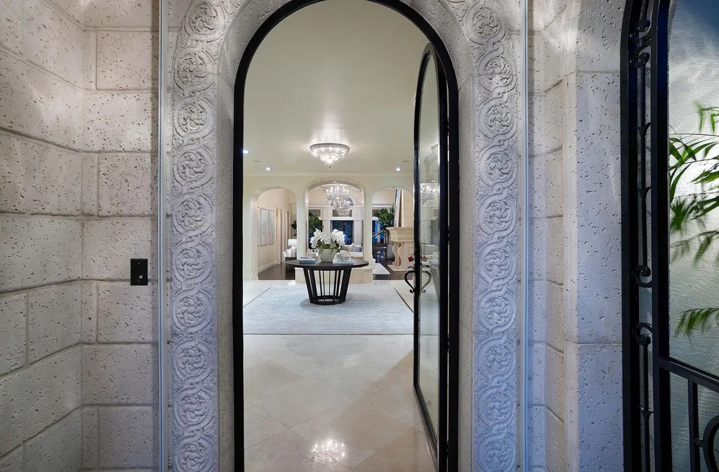 1207 Spanish River Road, Boca Raton, Florida is situated on a beautifully landscaped half-acre lot with breathtaking Intracoastal Waterway sunset views from the loggias and balconies of this magnificent estate. The ultimate Boca Raton, South Florida oasis features unparalleled magnificence, timeless beauty, and provides a unique opportunity to experience a luxury lifestyle at its most refined.