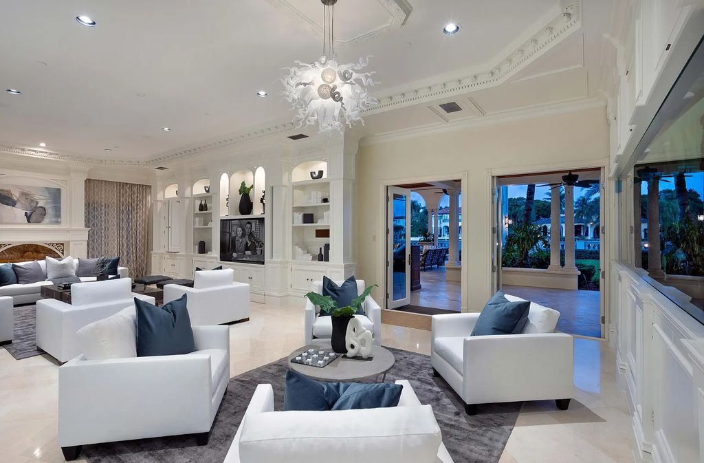 1207 Spanish River Road, Boca Raton, Florida is situated on a beautifully landscaped half-acre lot with breathtaking Intracoastal Waterway sunset views from the loggias and balconies of this magnificent estate. The ultimate Boca Raton, South Florida oasis features unparalleled magnificence, timeless beauty, and provides a unique opportunity to experience a luxury lifestyle at its most refined.