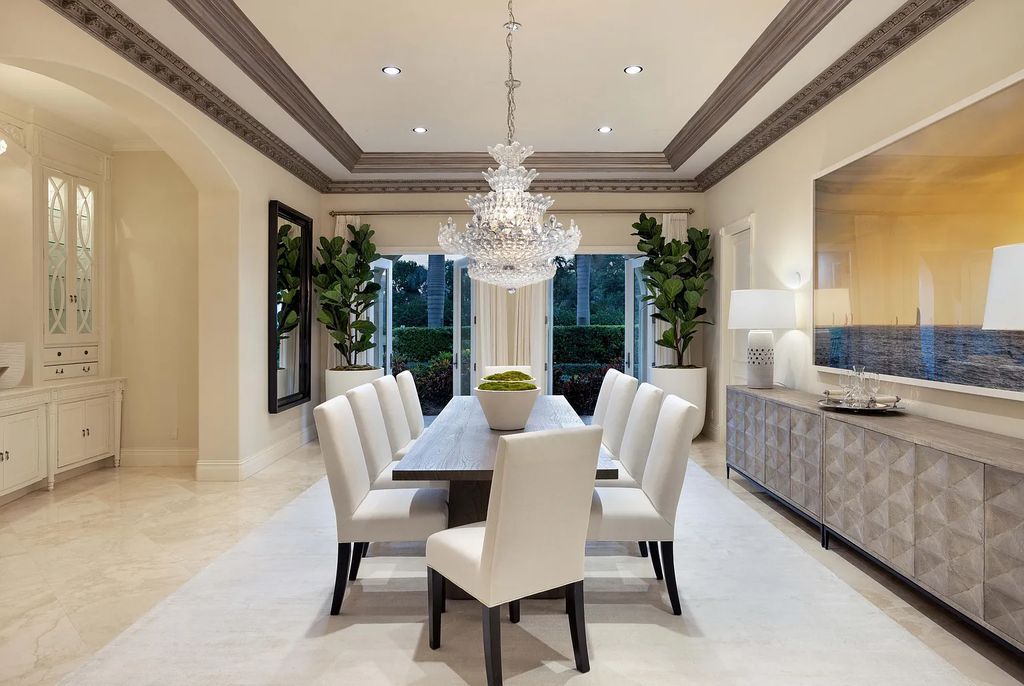 1207 Spanish River Road, Boca Raton, Florida is situated on a beautifully landscaped half-acre lot with breathtaking Intracoastal Waterway sunset views from the loggias and balconies of this magnificent estate. The ultimate Boca Raton, South Florida oasis features unparalleled magnificence, timeless beauty, and provides a unique opportunity to experience a luxury lifestyle at its most refined.