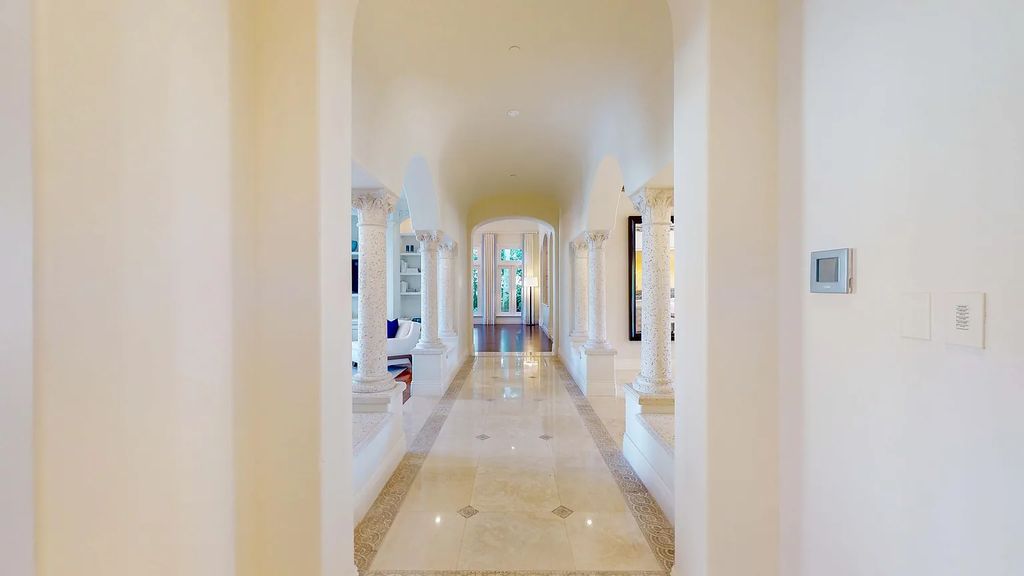 1207 Spanish River Road, Boca Raton, Florida is situated on a beautifully landscaped half-acre lot with breathtaking Intracoastal Waterway sunset views from the loggias and balconies of this magnificent estate. The ultimate Boca Raton, South Florida oasis features unparalleled magnificence, timeless beauty, and provides a unique opportunity to experience a luxury lifestyle at its most refined.