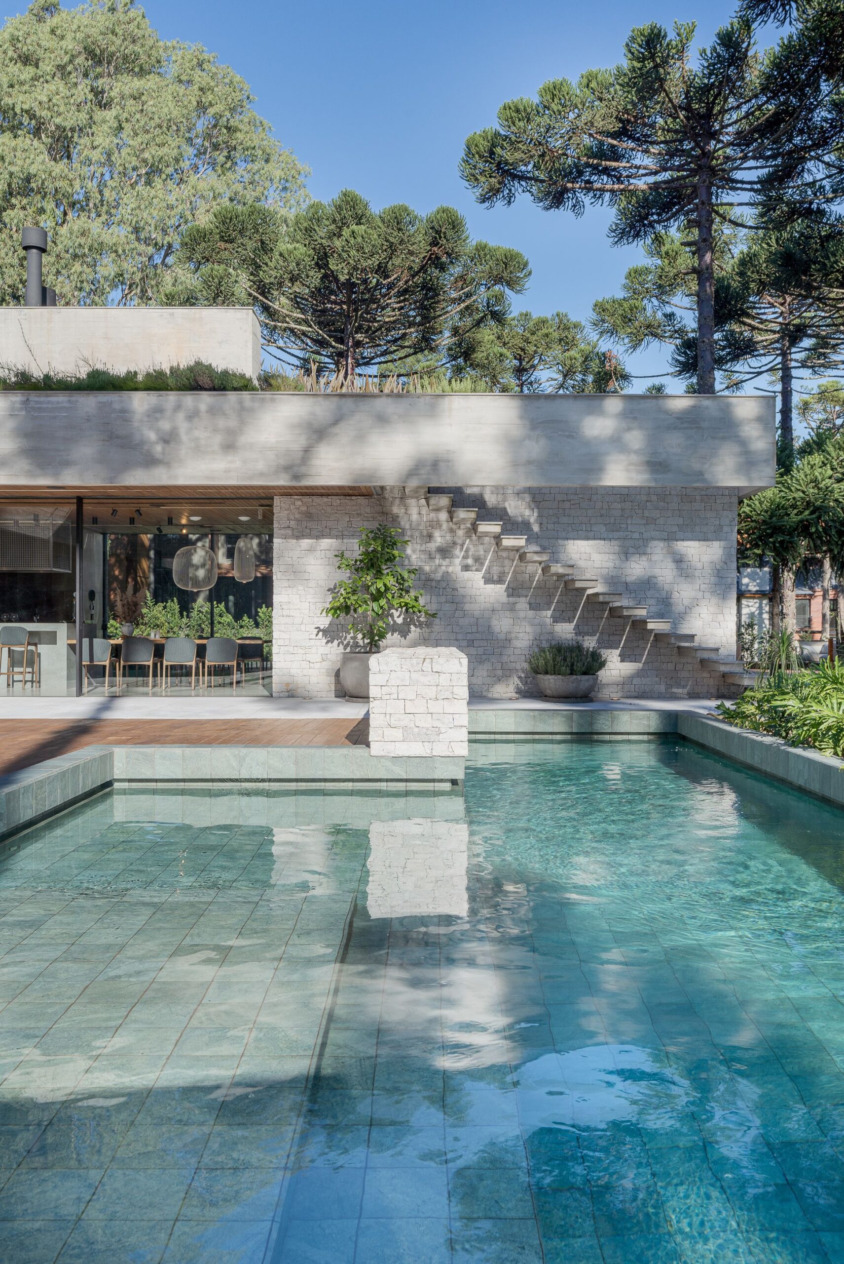 Aspen House, U-shaped form with nature connection by Studiocolnaghi