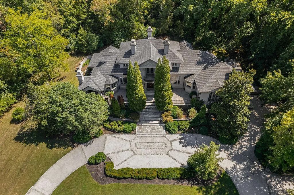 The Home in Nashville provides extensive landscaping throughout the property with dogwoods, hydrangeas and a meandering creek, now available for sale. This home located at 1310 Chickering Rd, Nashville, Tennessee