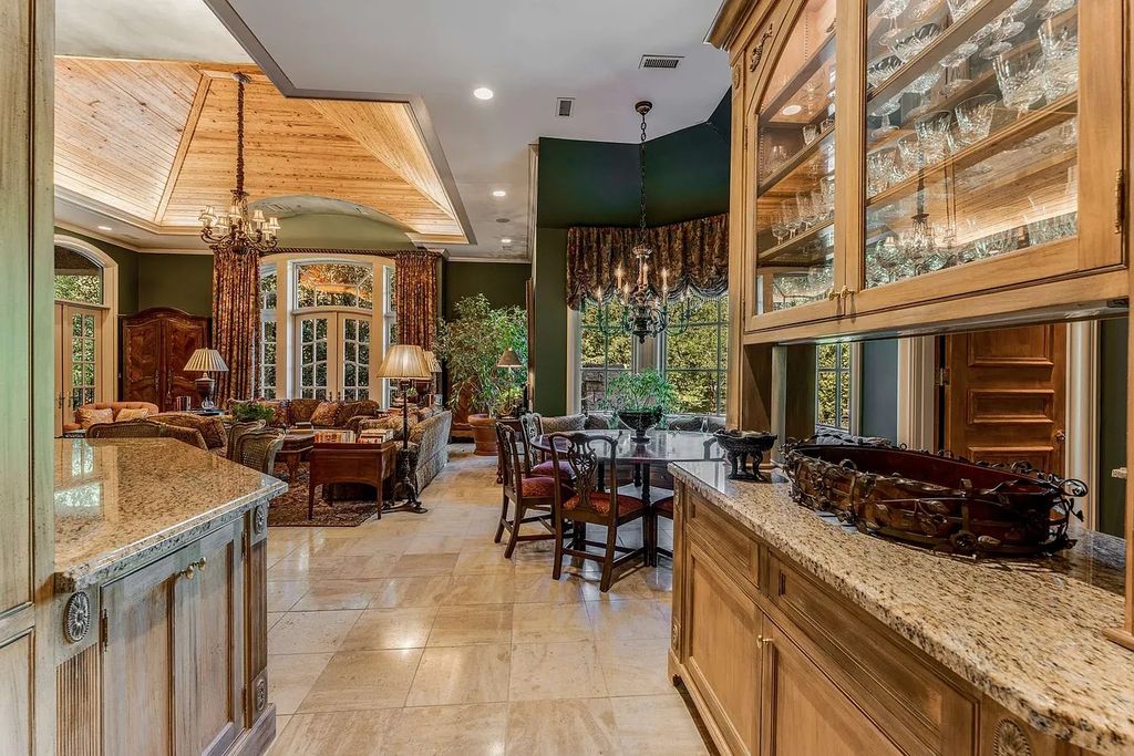 The Home in Nashville provides extensive landscaping throughout the property with dogwoods, hydrangeas and a meandering creek, now available for sale. This home located at 1310 Chickering Rd, Nashville, Tennessee