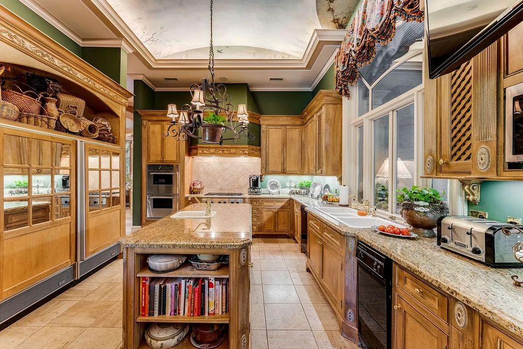 The Home in Nashville provides extensive landscaping throughout the property with dogwoods, hydrangeas and a meandering creek, now available for sale. This home located at 1310 Chickering Rd, Nashville, Tennessee
