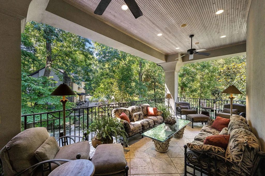The Home in Nashville provides extensive landscaping throughout the property with dogwoods, hydrangeas and a meandering creek, now available for sale. This home located at 1310 Chickering Rd, Nashville, Tennessee