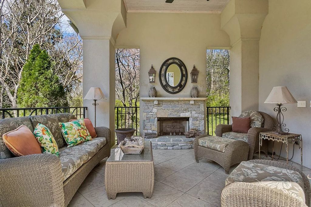 The Home in Nashville provides extensive landscaping throughout the property with dogwoods, hydrangeas and a meandering creek, now available for sale. This home located at 1310 Chickering Rd, Nashville, Tennessee