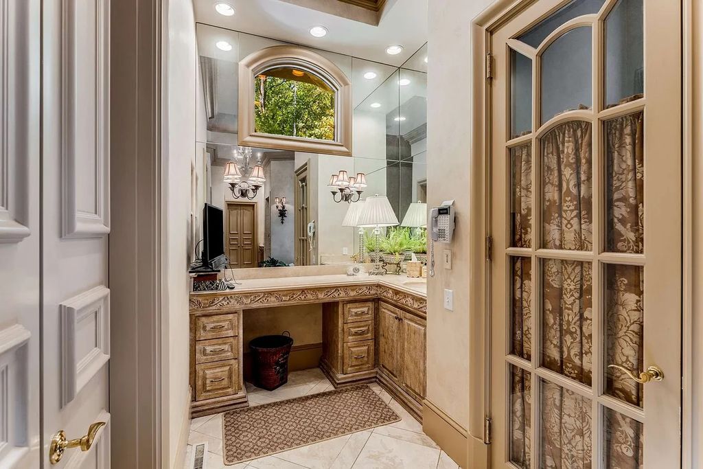 The Home in Nashville provides extensive landscaping throughout the property with dogwoods, hydrangeas and a meandering creek, now available for sale. This home located at 1310 Chickering Rd, Nashville, Tennessee