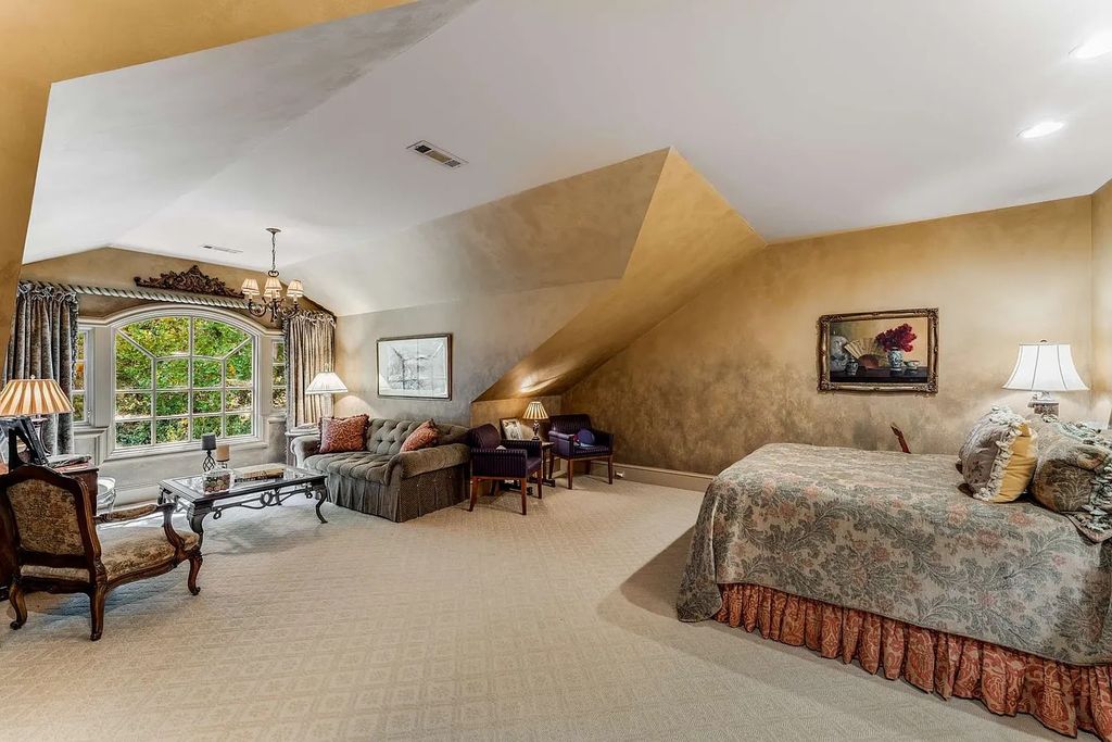 The Home in Nashville provides extensive landscaping throughout the property with dogwoods, hydrangeas and a meandering creek, now available for sale. This home located at 1310 Chickering Rd, Nashville, Tennessee