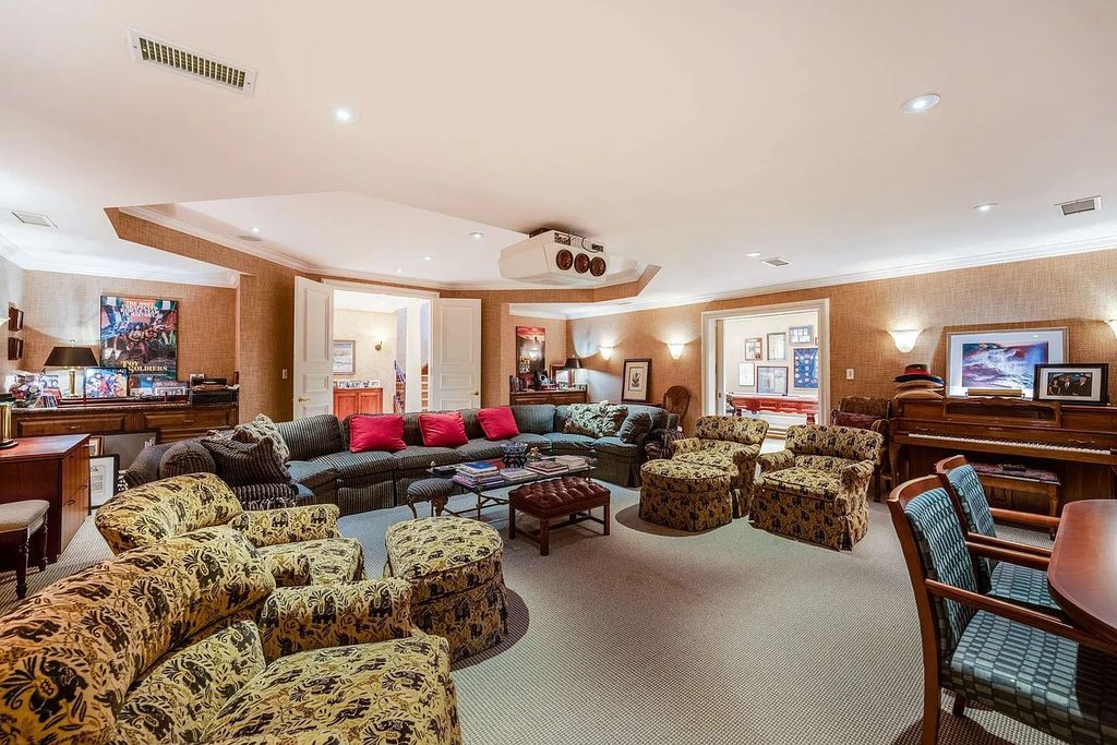 The Home in Nashville provides extensive landscaping throughout the property with dogwoods, hydrangeas and a meandering creek, now available for sale. This home located at 1310 Chickering Rd, Nashville, Tennessee