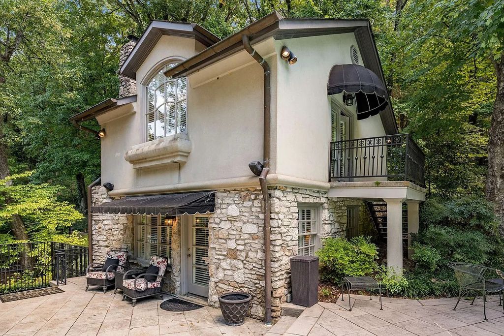 The Home in Nashville provides extensive landscaping throughout the property with dogwoods, hydrangeas and a meandering creek, now available for sale. This home located at 1310 Chickering Rd, Nashville, Tennessee