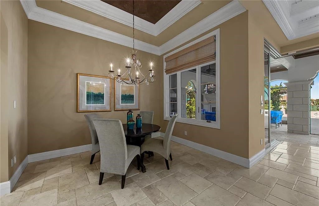 6097 Sunnyslope Drive, Naples, Florida, built by Michelangelo Builders, earning “The Best of Custom Wood, National Dream Home” & 4 Aurora awards. The spectacularly designed 2-story grand estate in Quail West is decorated with exquisite, one-of-a-kind milled woodwork.