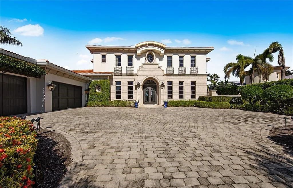 6097 Sunnyslope Drive, Naples, Florida, built by Michelangelo Builders, earning “The Best of Custom Wood, National Dream Home” & 4 Aurora awards. The spectacularly designed 2-story grand estate in Quail West is decorated with exquisite, one-of-a-kind milled woodwork.