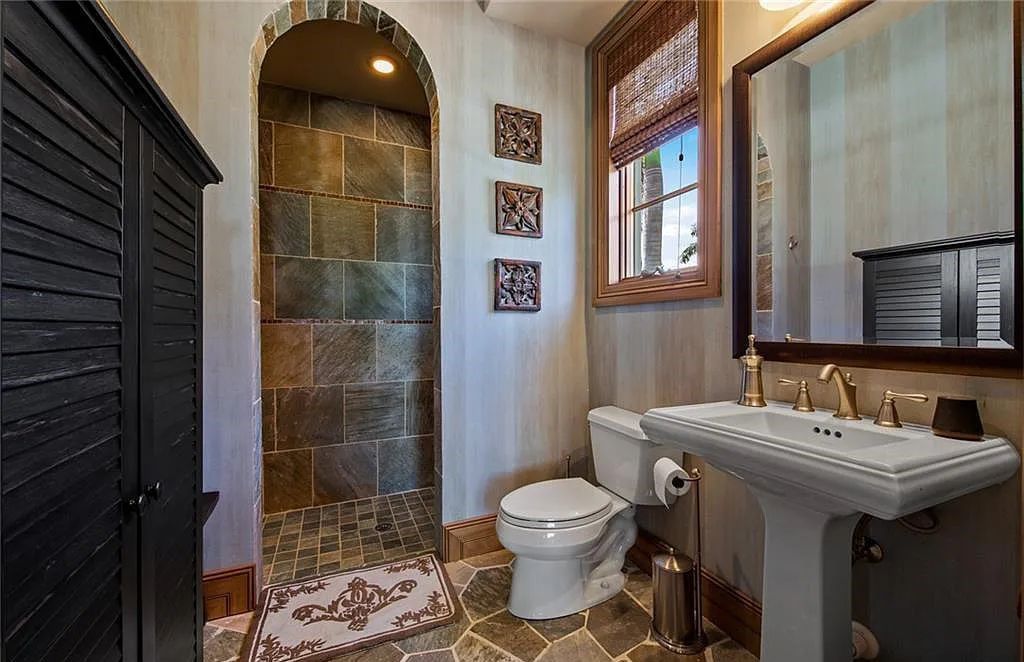 6097 Sunnyslope Drive, Naples, Florida, built by Michelangelo Builders, earning “The Best of Custom Wood, National Dream Home” & 4 Aurora awards. The spectacularly designed 2-story grand estate in Quail West is decorated with exquisite, one-of-a-kind milled woodwork.