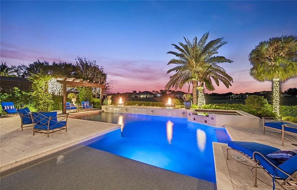 6097 Sunnyslope Drive, Naples, Florida, built by Michelangelo Builders, earning “The Best of Custom Wood, National Dream Home” & 4 Aurora awards. The spectacularly designed 2-story grand estate in Quail West is decorated with exquisite, one-of-a-kind milled woodwork.