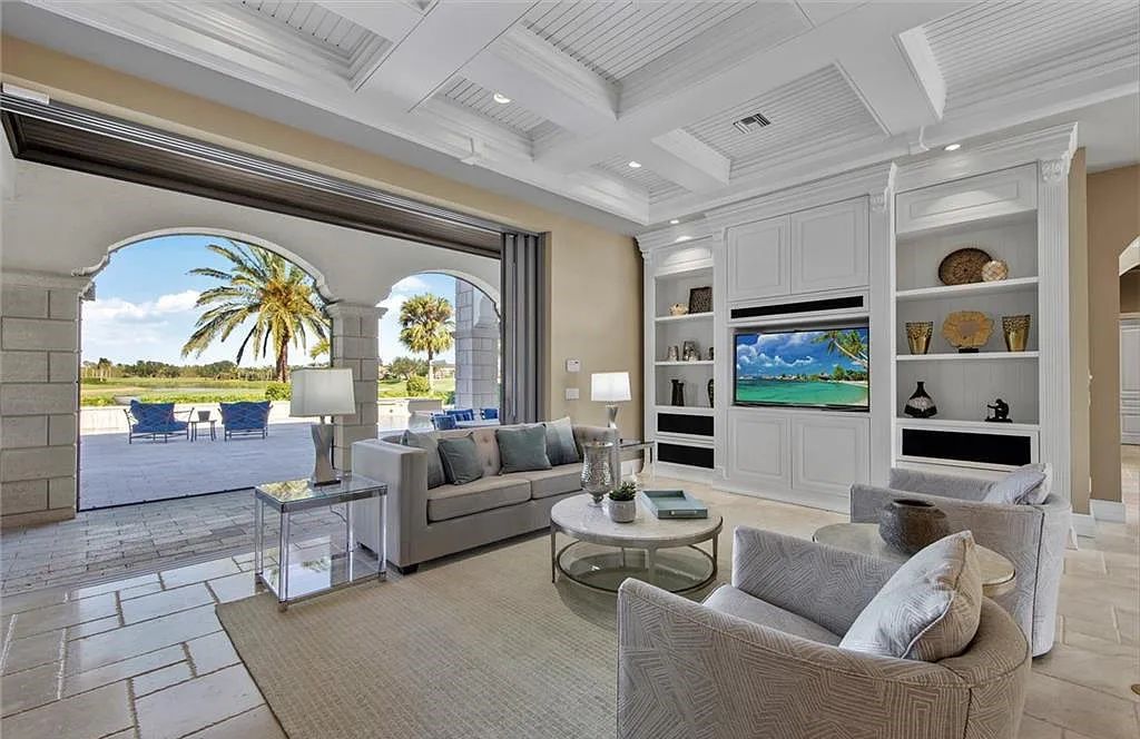 6097 Sunnyslope Drive, Naples, Florida, built by Michelangelo Builders, earning “The Best of Custom Wood, National Dream Home” & 4 Aurora awards. The spectacularly designed 2-story grand estate in Quail West is decorated with exquisite, one-of-a-kind milled woodwork.