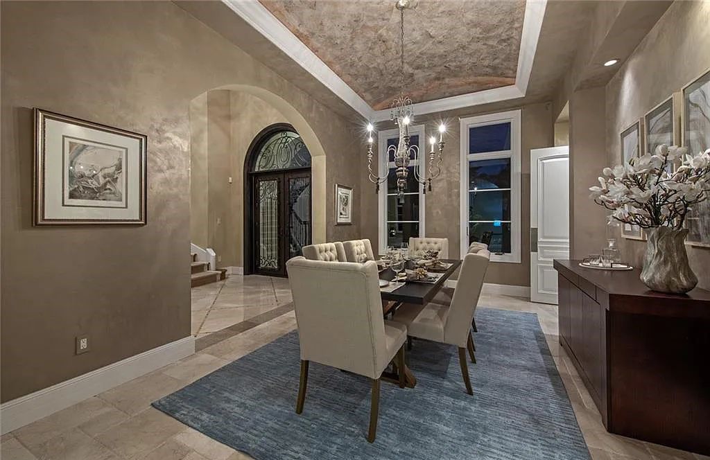 6097 Sunnyslope Drive, Naples, Florida, built by Michelangelo Builders, earning “The Best of Custom Wood, National Dream Home” & 4 Aurora awards. The spectacularly designed 2-story grand estate in Quail West is decorated with exquisite, one-of-a-kind milled woodwork.