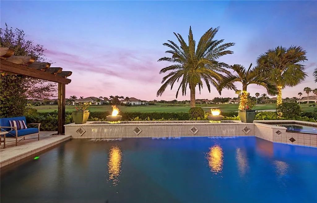 6097 Sunnyslope Drive, Naples, Florida, built by Michelangelo Builders, earning “The Best of Custom Wood, National Dream Home” & 4 Aurora awards. The spectacularly designed 2-story grand estate in Quail West is decorated with exquisite, one-of-a-kind milled woodwork.