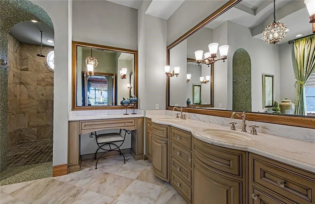 6097 Sunnyslope Drive, Naples, Florida, built by Michelangelo Builders, earning “The Best of Custom Wood, National Dream Home” & 4 Aurora awards. The spectacularly designed 2-story grand estate in Quail West is decorated with exquisite, one-of-a-kind milled woodwork.