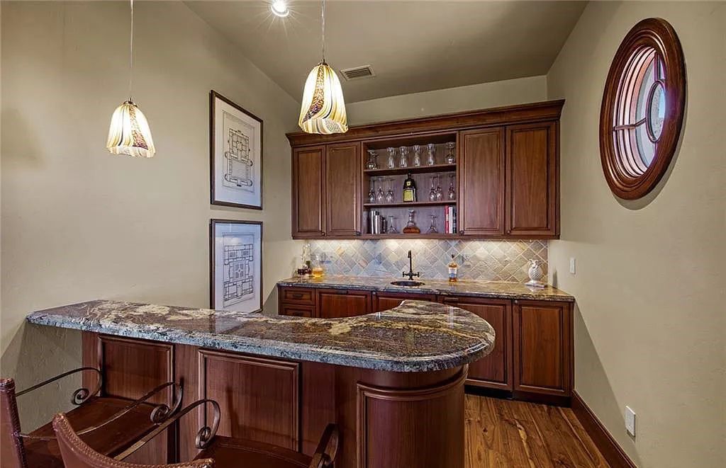 6097 Sunnyslope Drive, Naples, Florida, built by Michelangelo Builders, earning “The Best of Custom Wood, National Dream Home” & 4 Aurora awards. The spectacularly designed 2-story grand estate in Quail West is decorated with exquisite, one-of-a-kind milled woodwork.