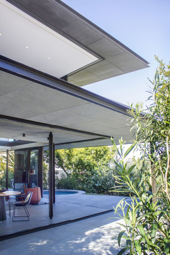 Cranberry Pavilion House prominent with its dark color by Wright Architects 1